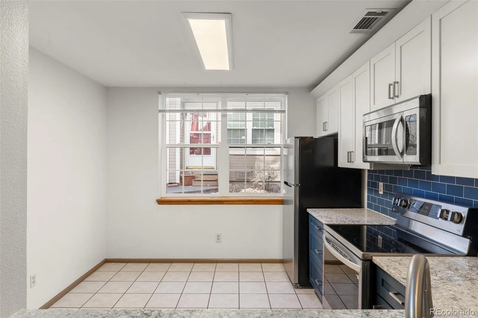 5702 W Asbury Place #102 Lakewood CO 80227 | MLS #REC1581261 05052026034402 1600 2