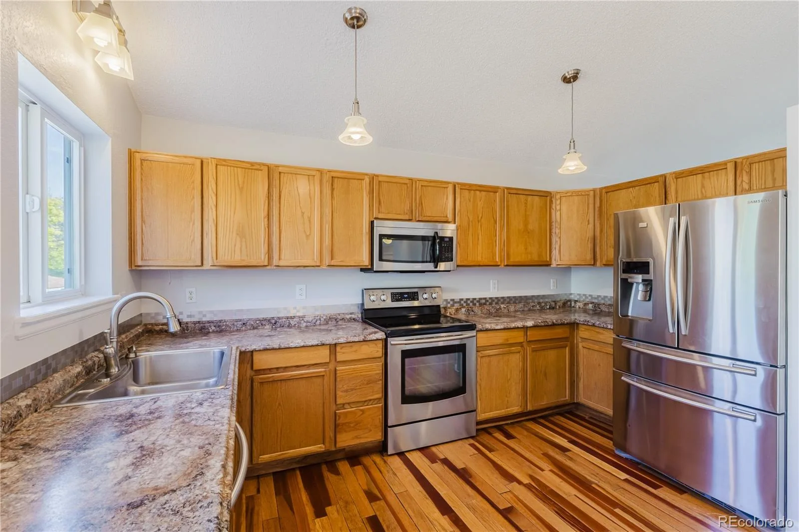 2180 S Uravan Street Aurora CO 80013 MLS #REC1619946 06092026074842 1600 5