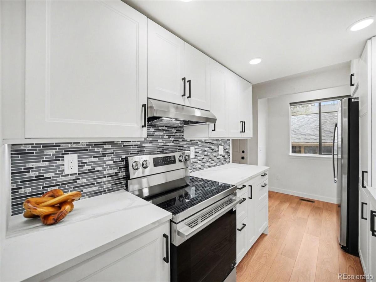 8711 Carr Loop Arvada CO 80005 | MLS #REC1744415 MLS #REC1744415 image #0