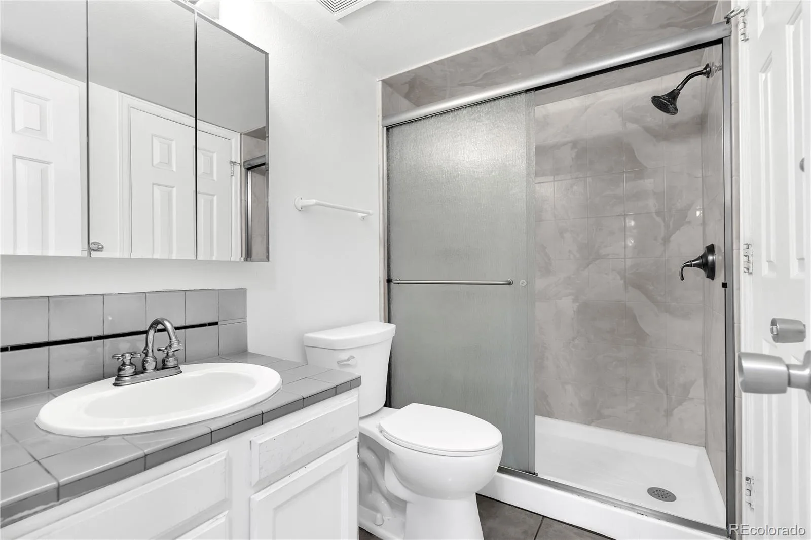 12524 E Pacific Circle #B Aurora CO 80014 | MLS #REC1774465 08242026204844 1600 12