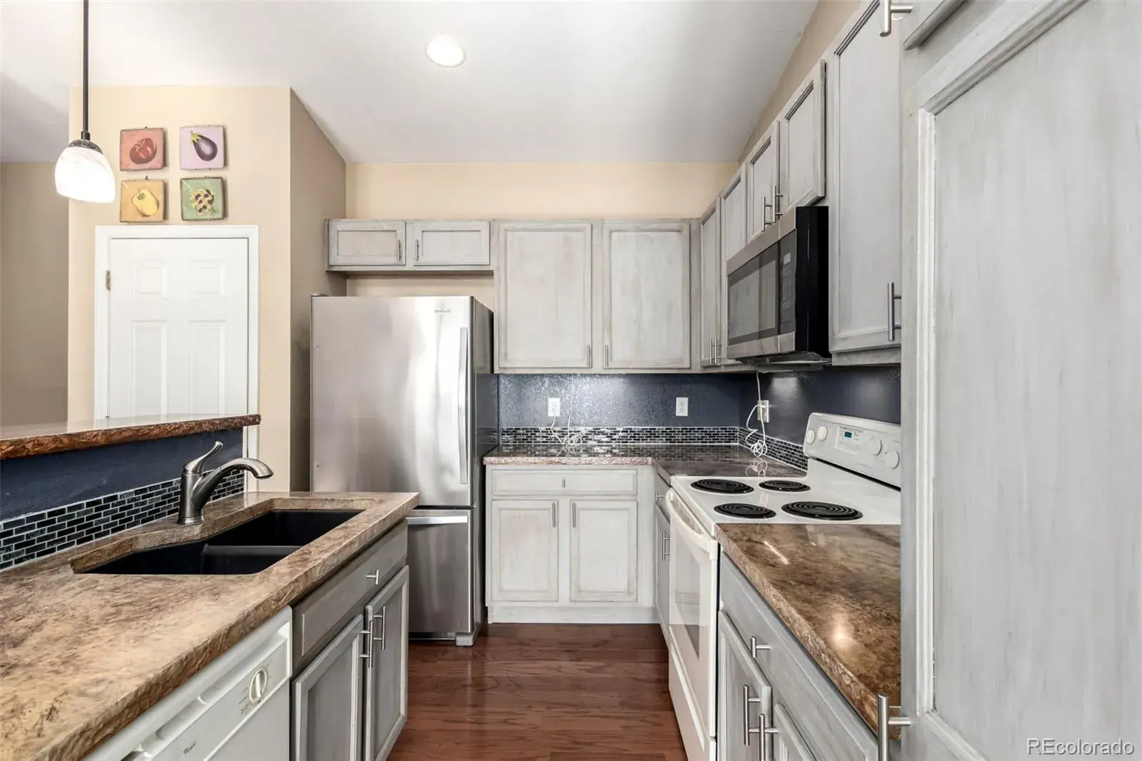 7621 E 26th Avenue Denver CO 80238 | MLS #REC1794210 02262026154754 1600 8