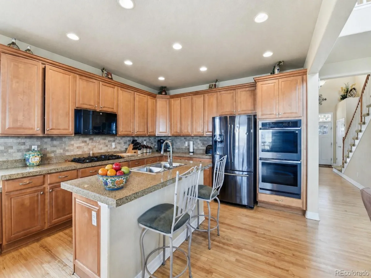 6875 S Buchanan Court Aurora CO 80016 | MLS #REC1849553 08282026163732 1200 12