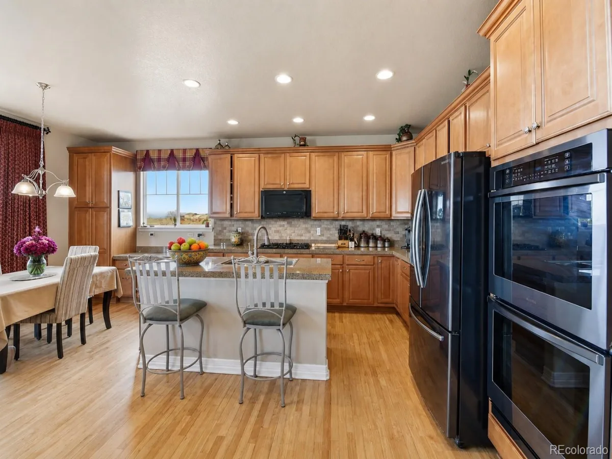 6875 S Buchanan Court Aurora CO 80016 | MLS #REC1849553 08282026163732 1200 13