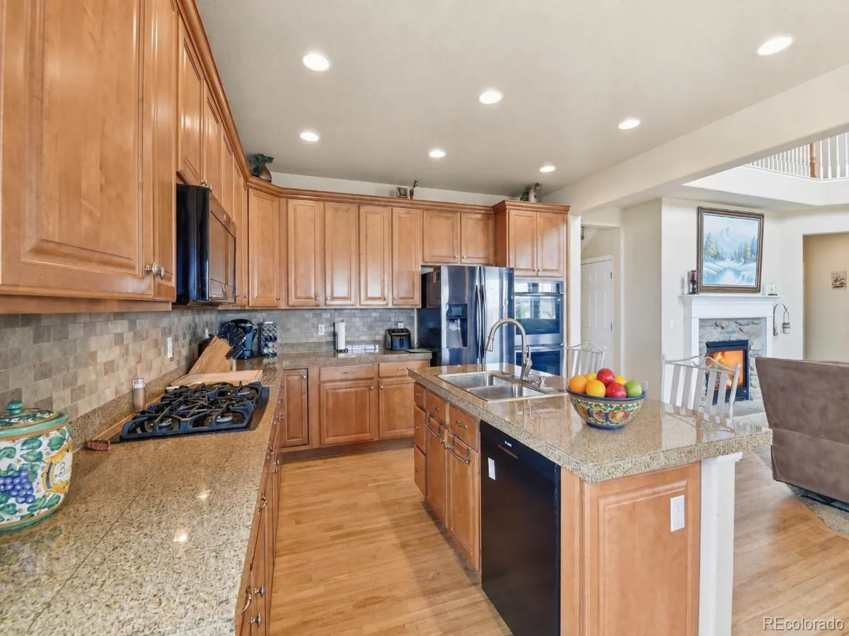 6875 S Buchanan Court Aurora CO 80016 | MLS #REC1849553 08282026163732 1200 14