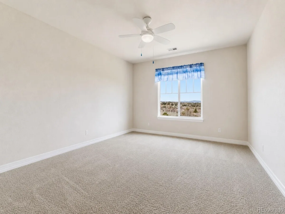 6875 S Buchanan Court Aurora CO 80016 | MLS #REC1849553 08282026163732 1200 23
