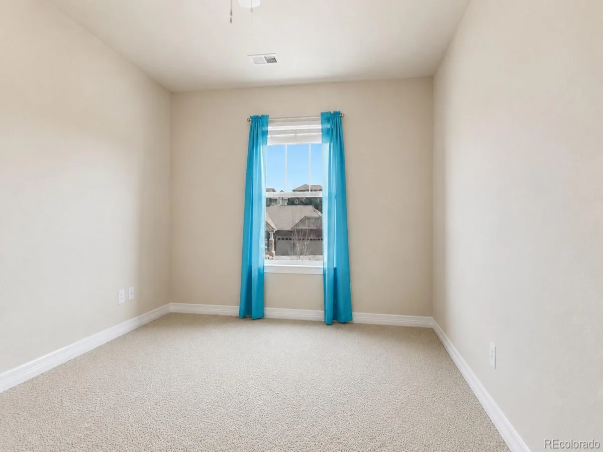 6875 S Buchanan Court Aurora CO 80016 | MLS #REC1849553 08282026163732 1200 24