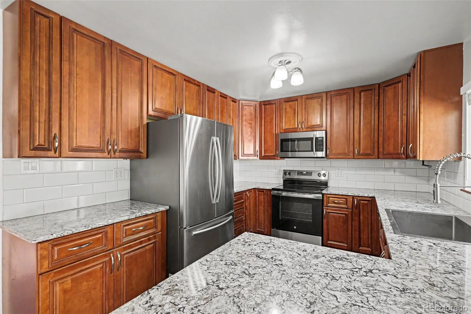 3217 S Stuart Street Denver CO 80236 MLS #REC1851000 05282026151756 1600 7