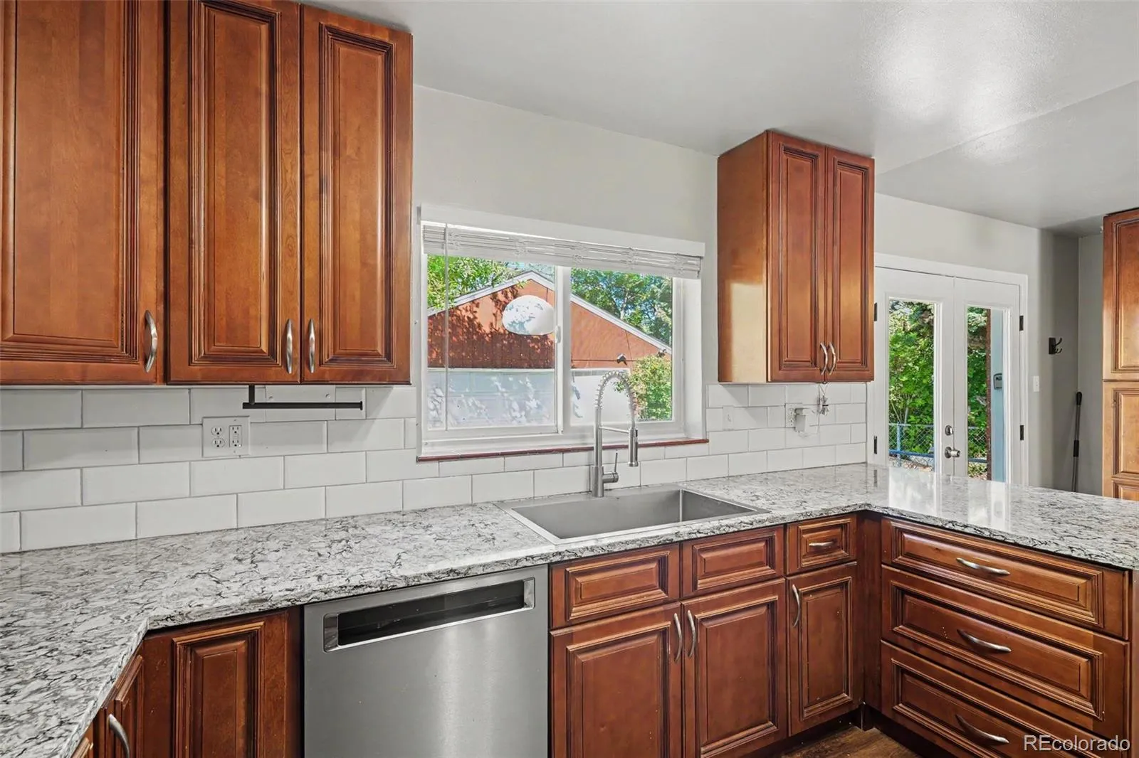 3217 S Stuart Street Denver CO 80236 MLS #REC1851000 05282026151756 1600 9