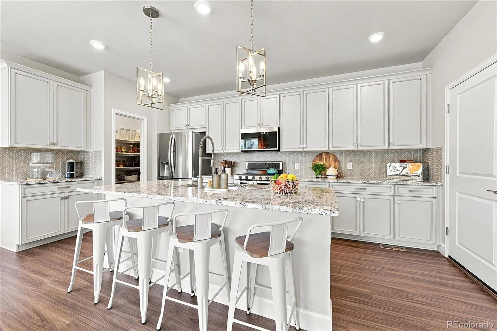 8281 Hunts Peak Street Littleton CO 80125 | MLS #REC1882609 07242026031655 1600 4