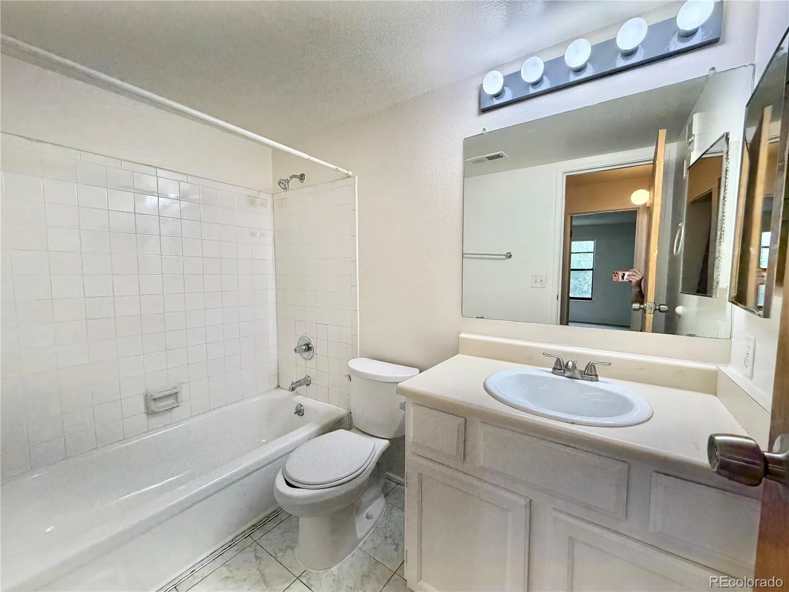 12043 E Harvard Avenue #208 Aurora CO 80014 | MLS #REC1895792 09232026111400 1600 7