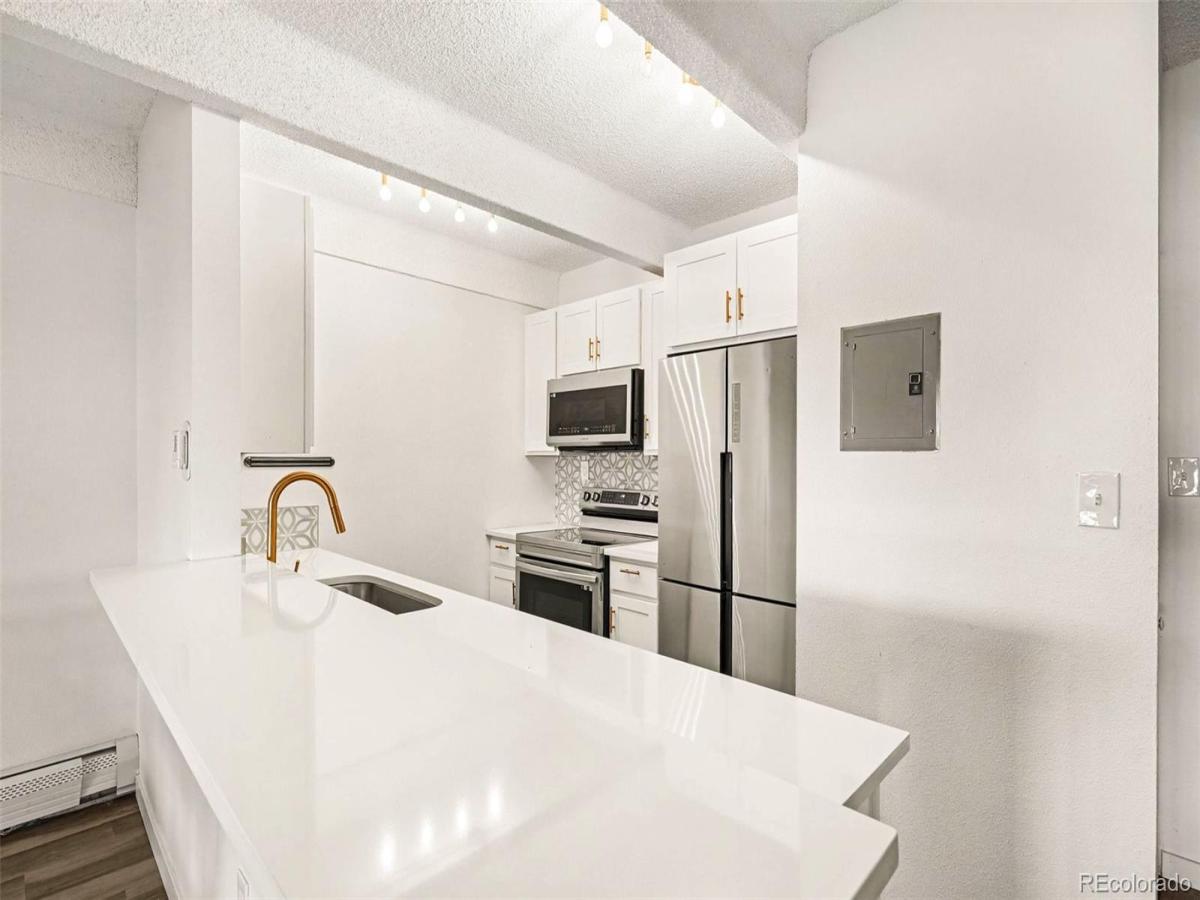 10650 E Tennessee Avenue #108 Aurora CO 80012 | MLS #REC1918429 MLS #REC1918429 image #0