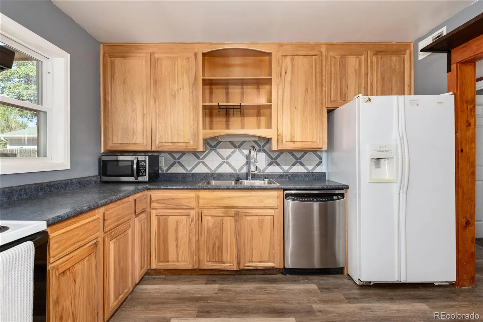 1057 Ursula Street Aurora CO 80011 | MLS #REC1966134 10092026173015 1600 12