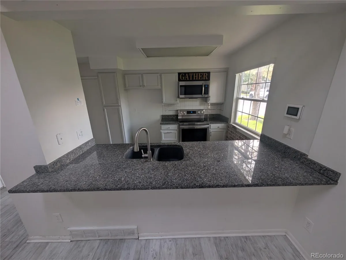 1041 S Fraser Way Aurora CO 80012 | MLS #REC1975514 08312026180522 1200 6