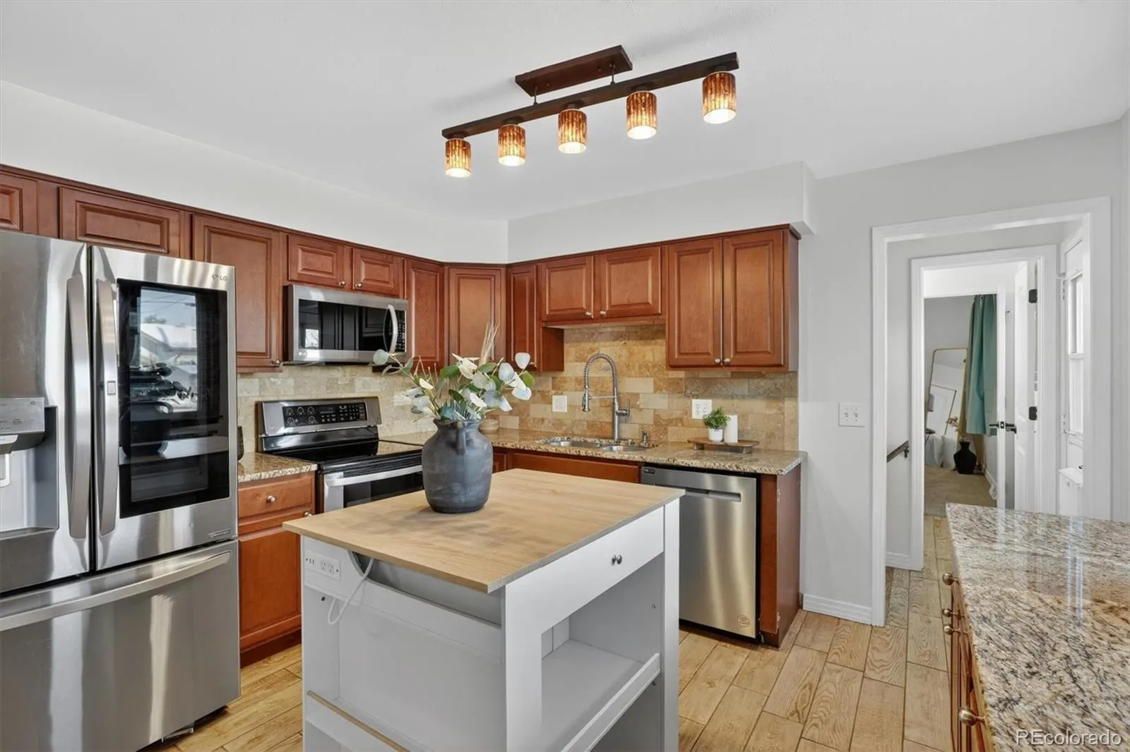 1348 S Drexel Way Lakewood CO 80232 MLS #REC1998084 05082026031645 1600 5