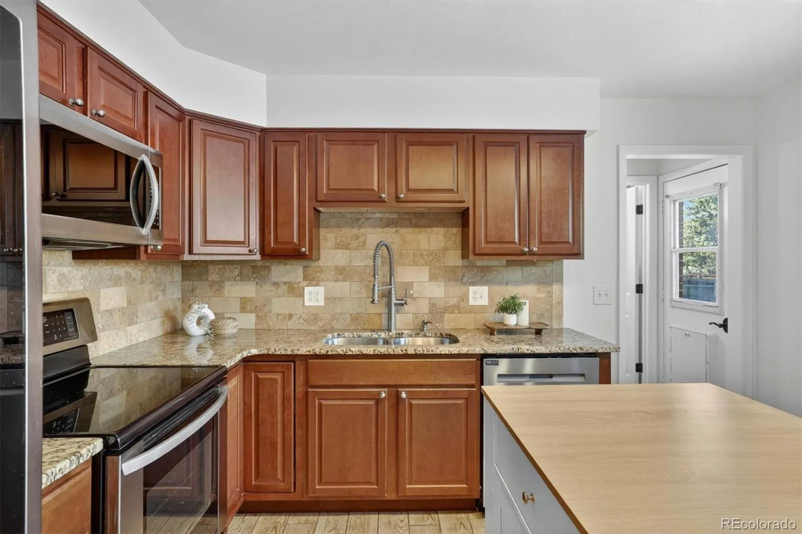 1348 S Drexel Way Lakewood CO 80232 MLS #REC1998084 05082026031645 1600 7