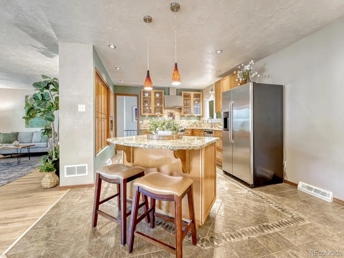 6904 E Villanova Place Denver CO 80224 | MLS #REC2040417 08192026221357 1200 5