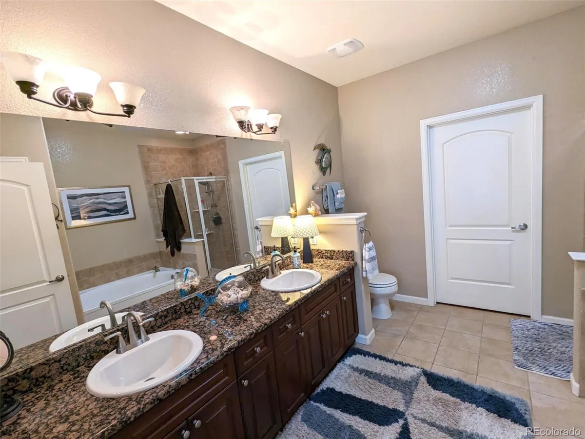 8551 Gold Peak Drive #A Littleton CO 80130 | MLS #REC2118748 08252026200309 1200 16