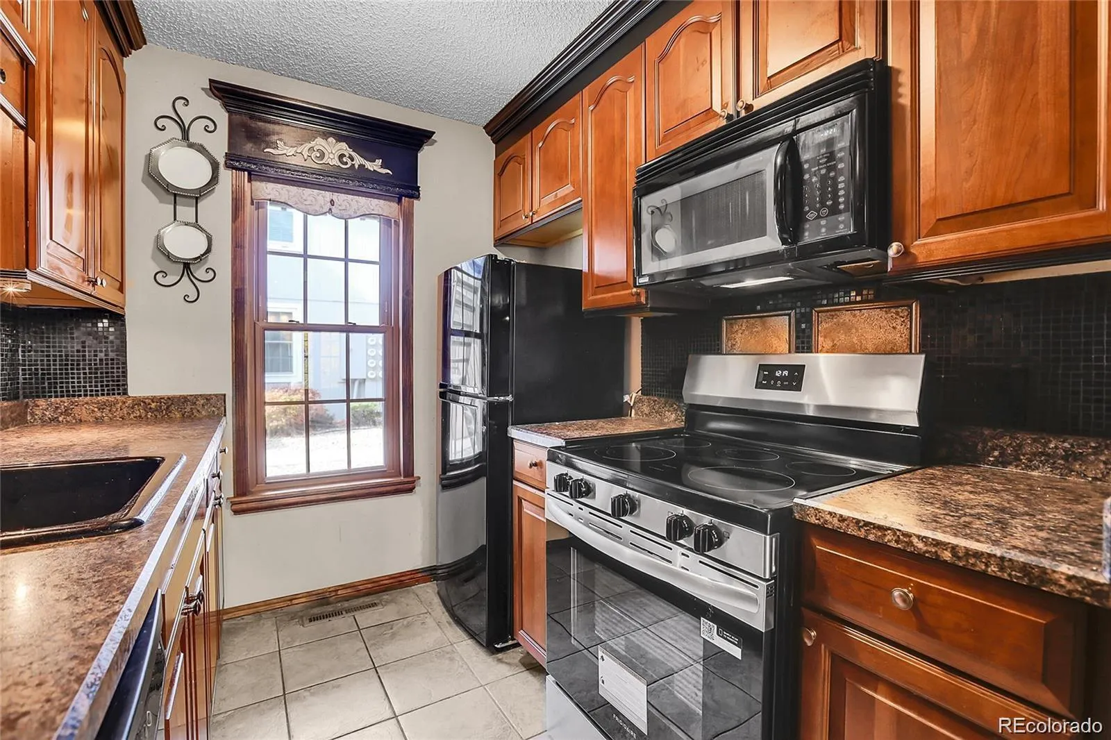 2301 E Fremont Avenue #U05 Centennial CO 80122 | MLS #REC2145809 04212026193854 1600 12