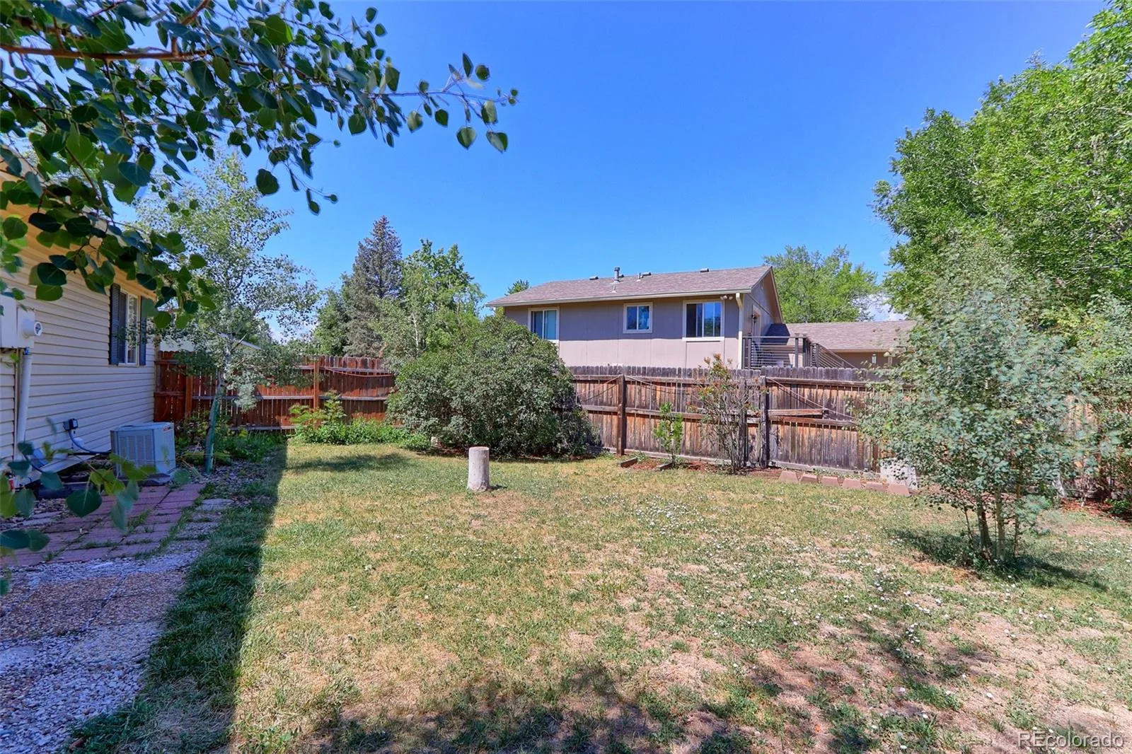 8793 W 87th Place Arvada CO 80005 | MLS #REC2192354 08032026214802 1600 1