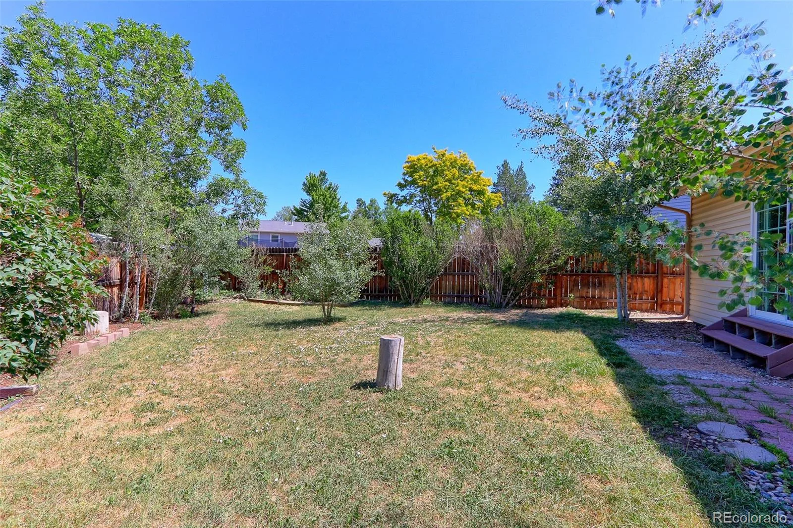 8793 W 87th Place Arvada CO 80005 | MLS #REC2192354 08032026214802 1600 21