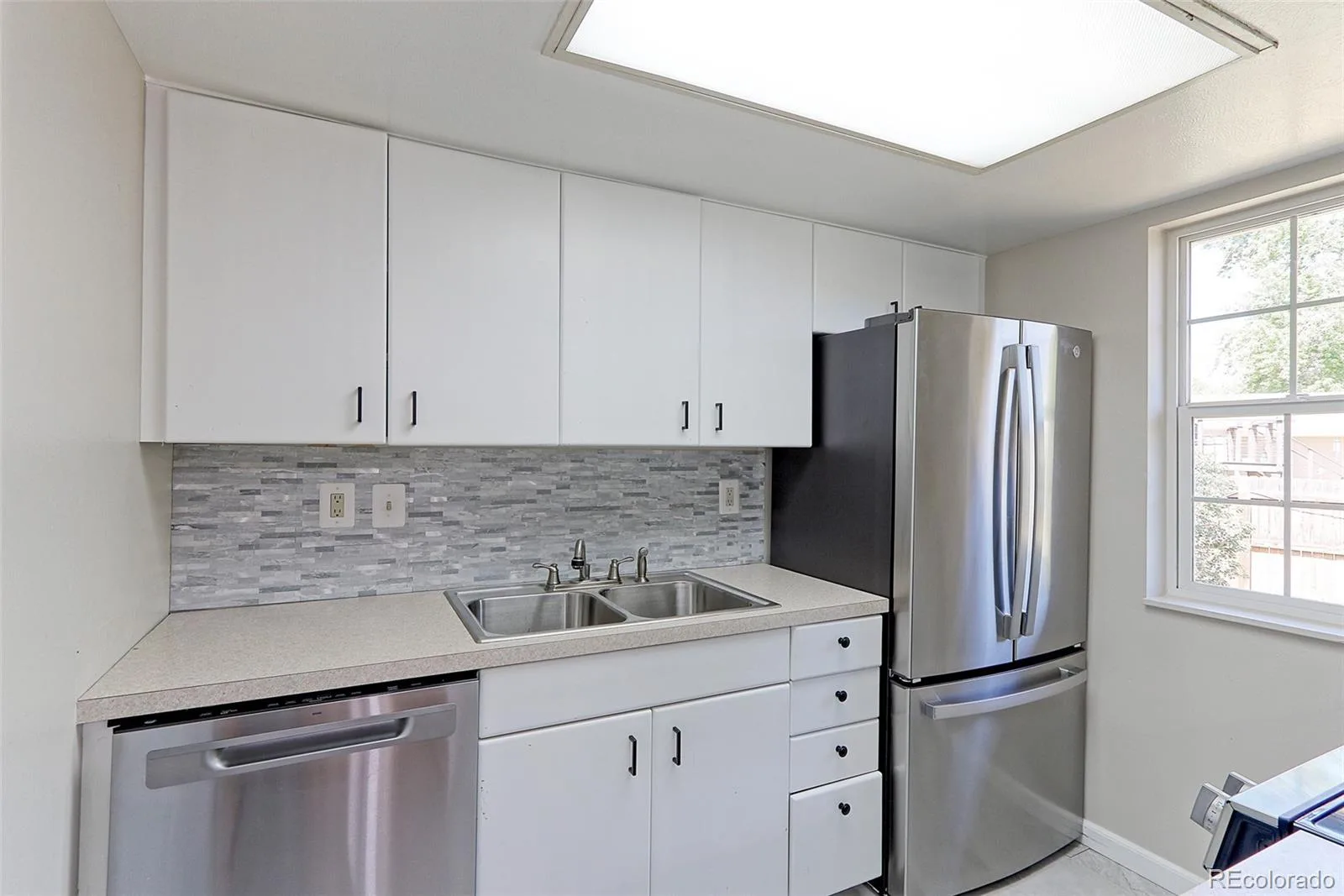 8793 W 87th Place Arvada CO 80005 | MLS #REC2192354 08032026214802 1600 5