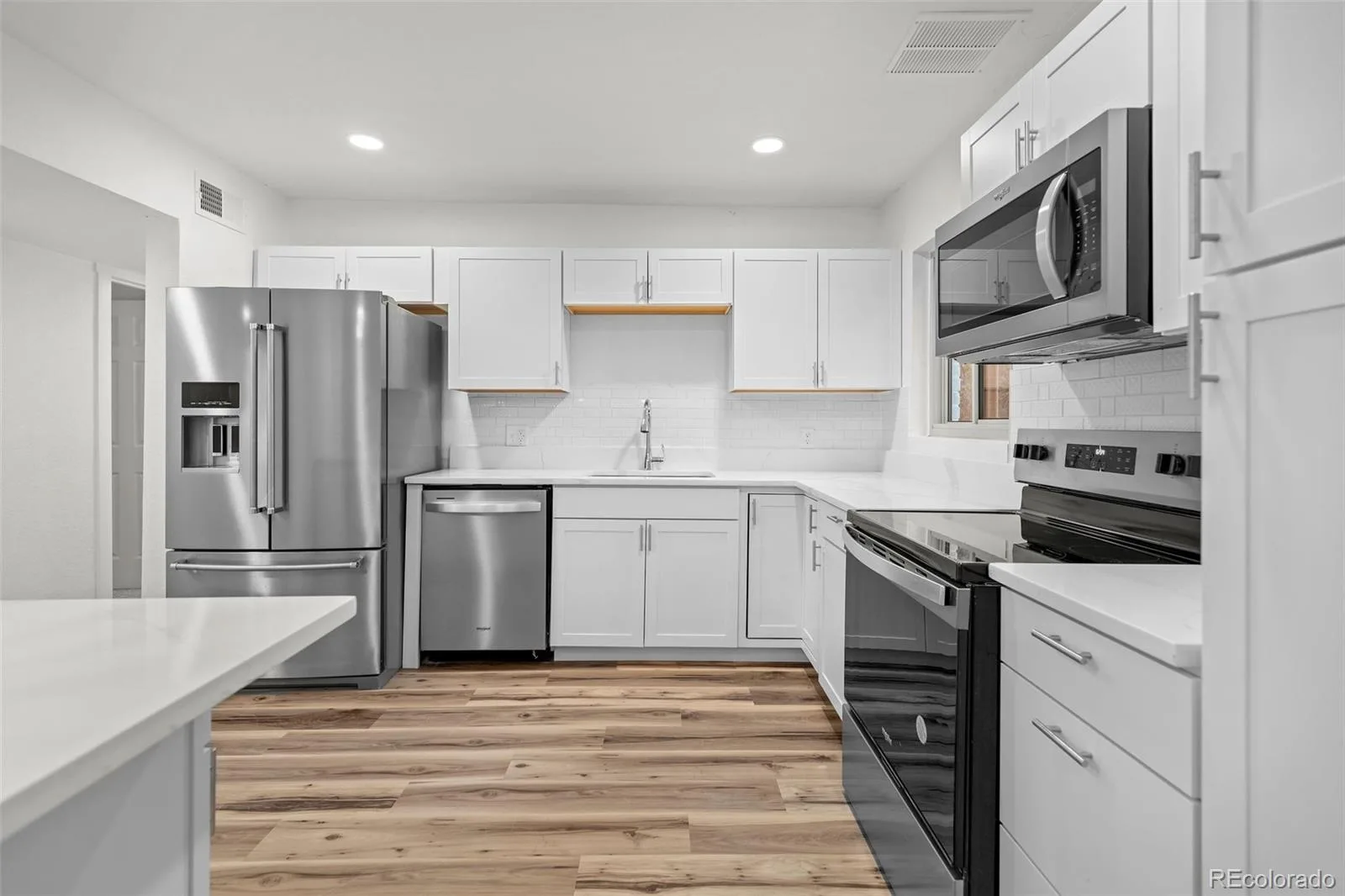 1283 Racine Street Aurora CO 80011 | MLS #REC2218612 10022026153427 1600 10