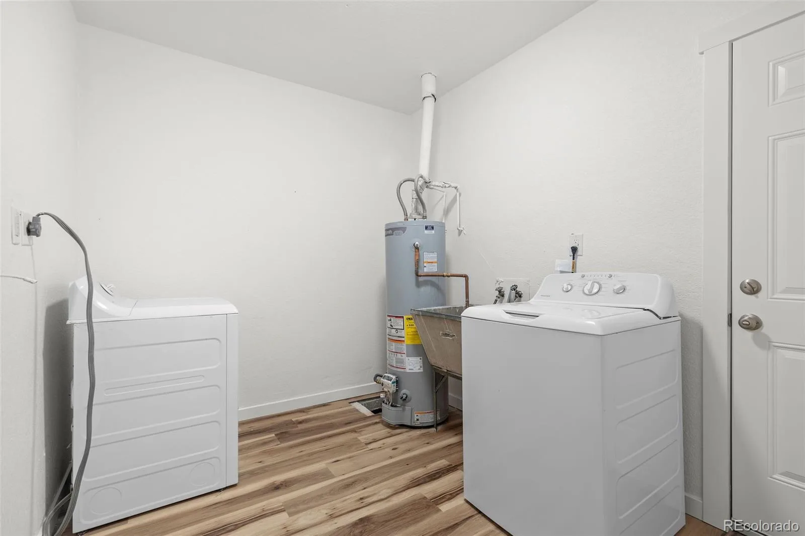 1283 Racine Street Aurora CO 80011 | MLS #REC2218612 10022026153427 1600 24