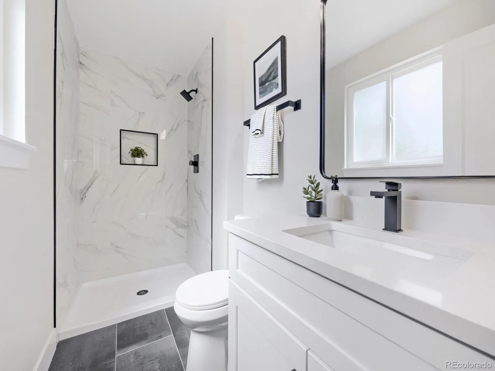 8937 W Woodard Drive Denver CO 80227 | MLS #REC2254720 09092026101847 1600 18