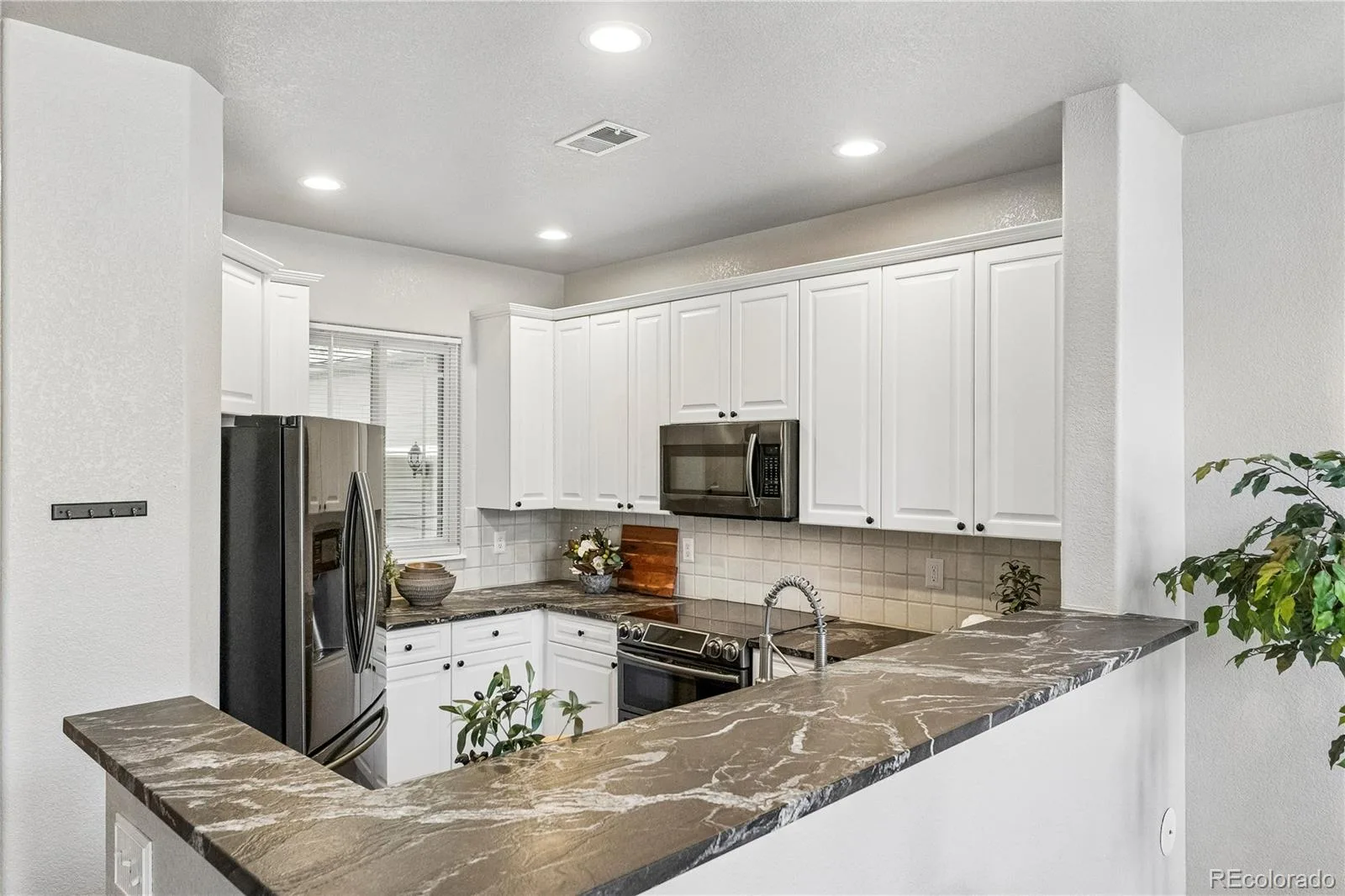 4348 S Queen Court Littleton CO 80127 | MLS #REC2290801 08212026193118 1600 6