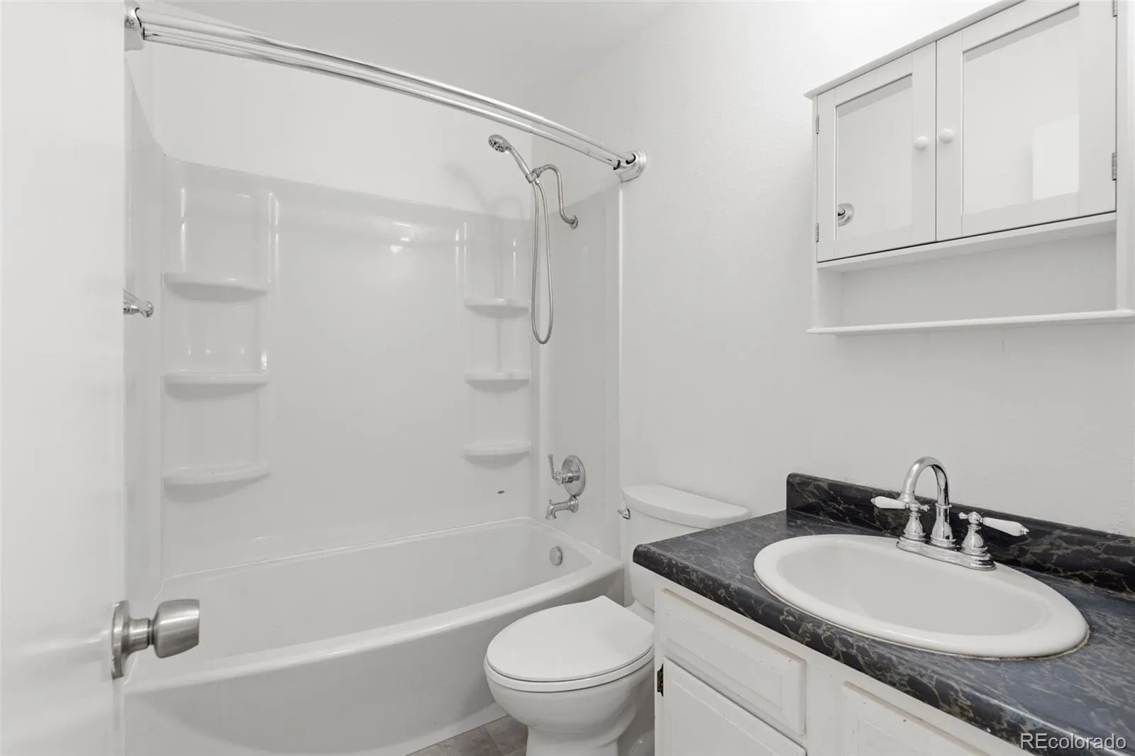 1719 S Lee Street #D Lakewood CO 80232 | MLS #REC2338886 05202026194238 1600 18