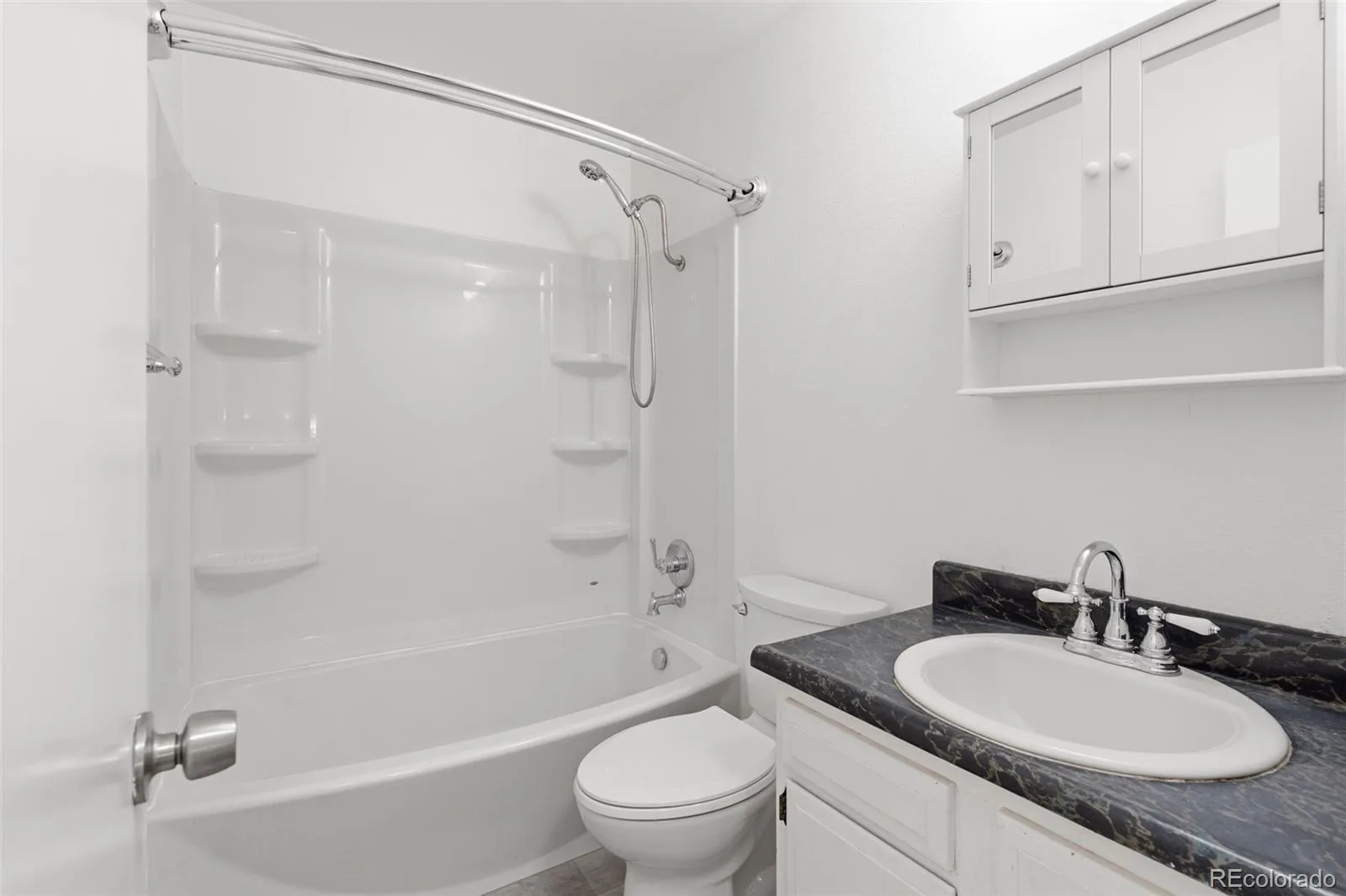 1719 S Lee Street #D Lakewood CO 80232 | MLS #REC2338886 09292026234728 1600 18