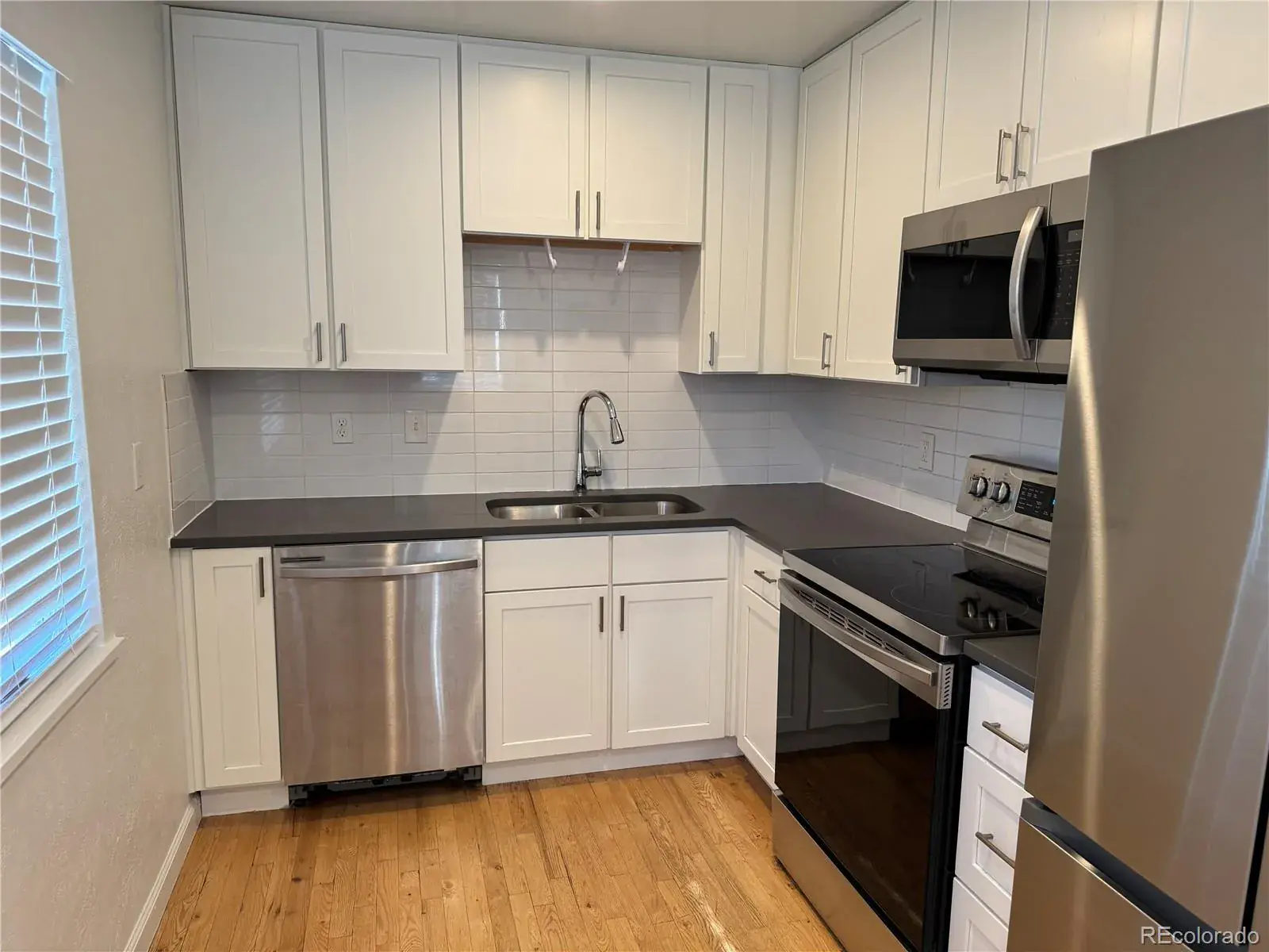 1671 Oswego Street Aurora CO 80010 MLS #REC2344482 01032026023407 1600 5
