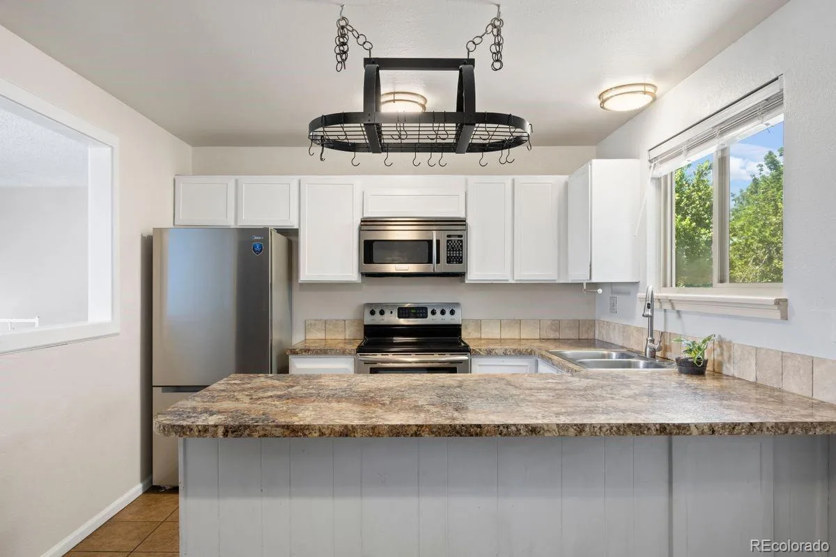 3347 S Laredo Court Aurora CO 80013 | MLS #REC2377980 07282026225712 1200 6