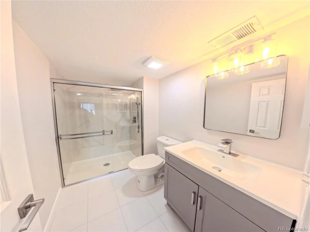8335 Fairmount Drive #102 #4 Denver CO 80247 | MLS #REC2395022 08222026191452 1200 13