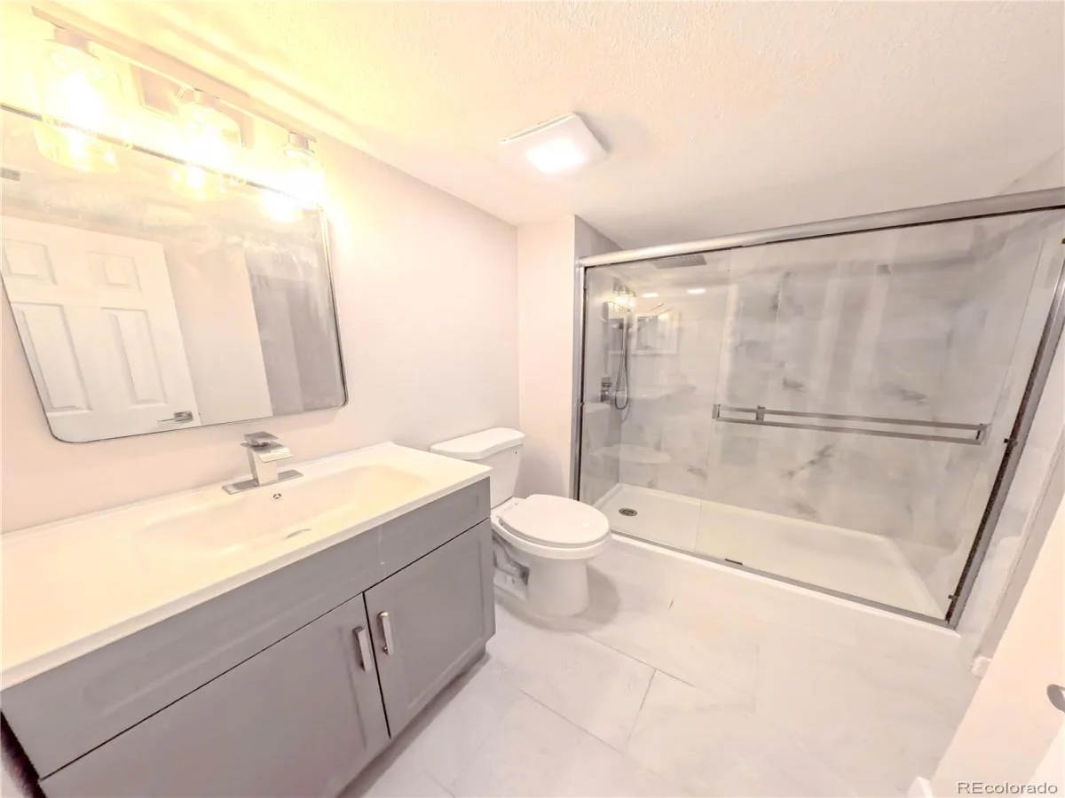 8335 Fairmount Drive #102 #4 Denver CO 80247 | MLS #REC2395022 08222026191452 1200 9