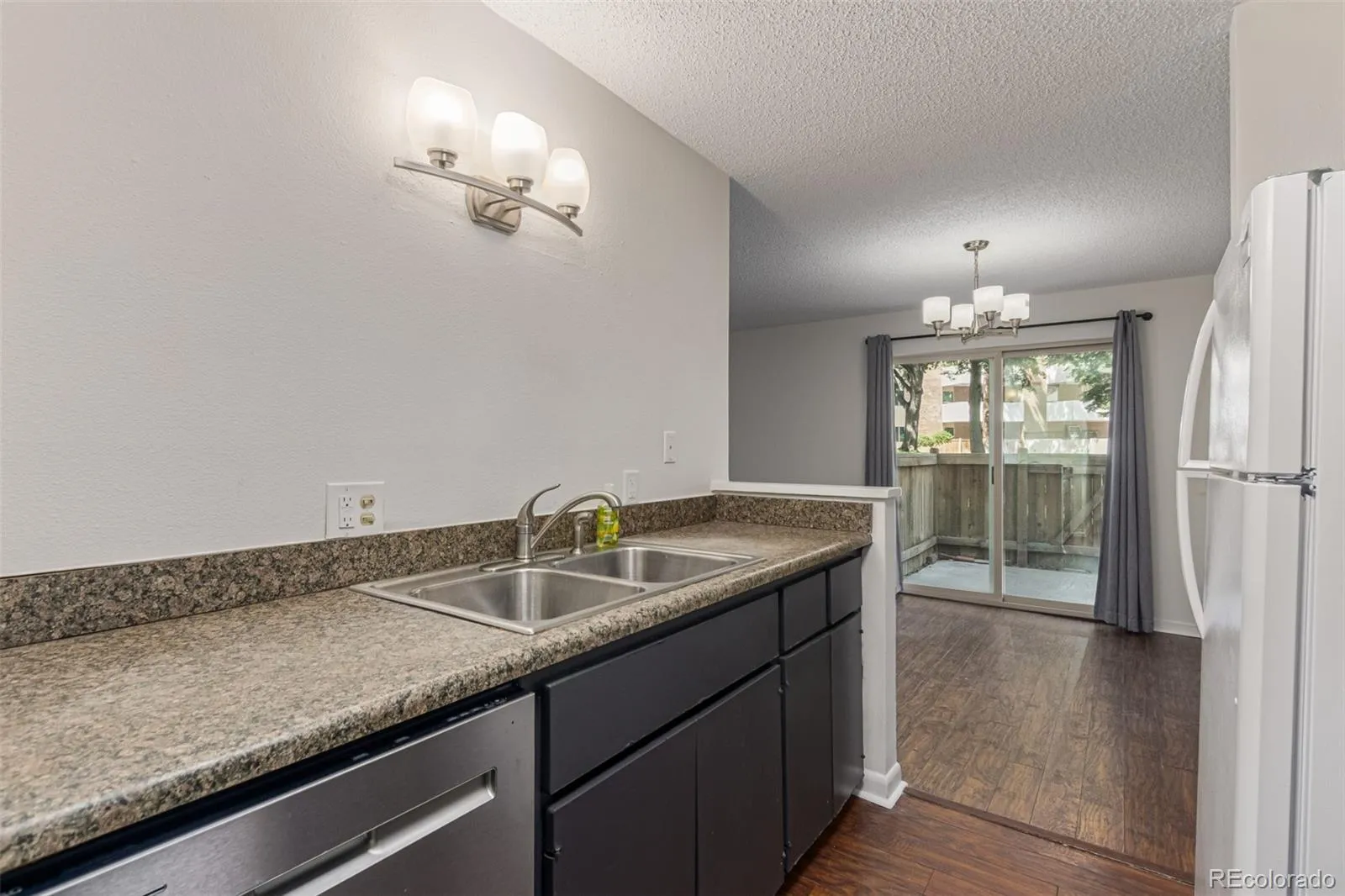 6455 E Bates Avenue #4-105 Denver CO 80222 MLS #REC2407731 04282026171834 1600 11