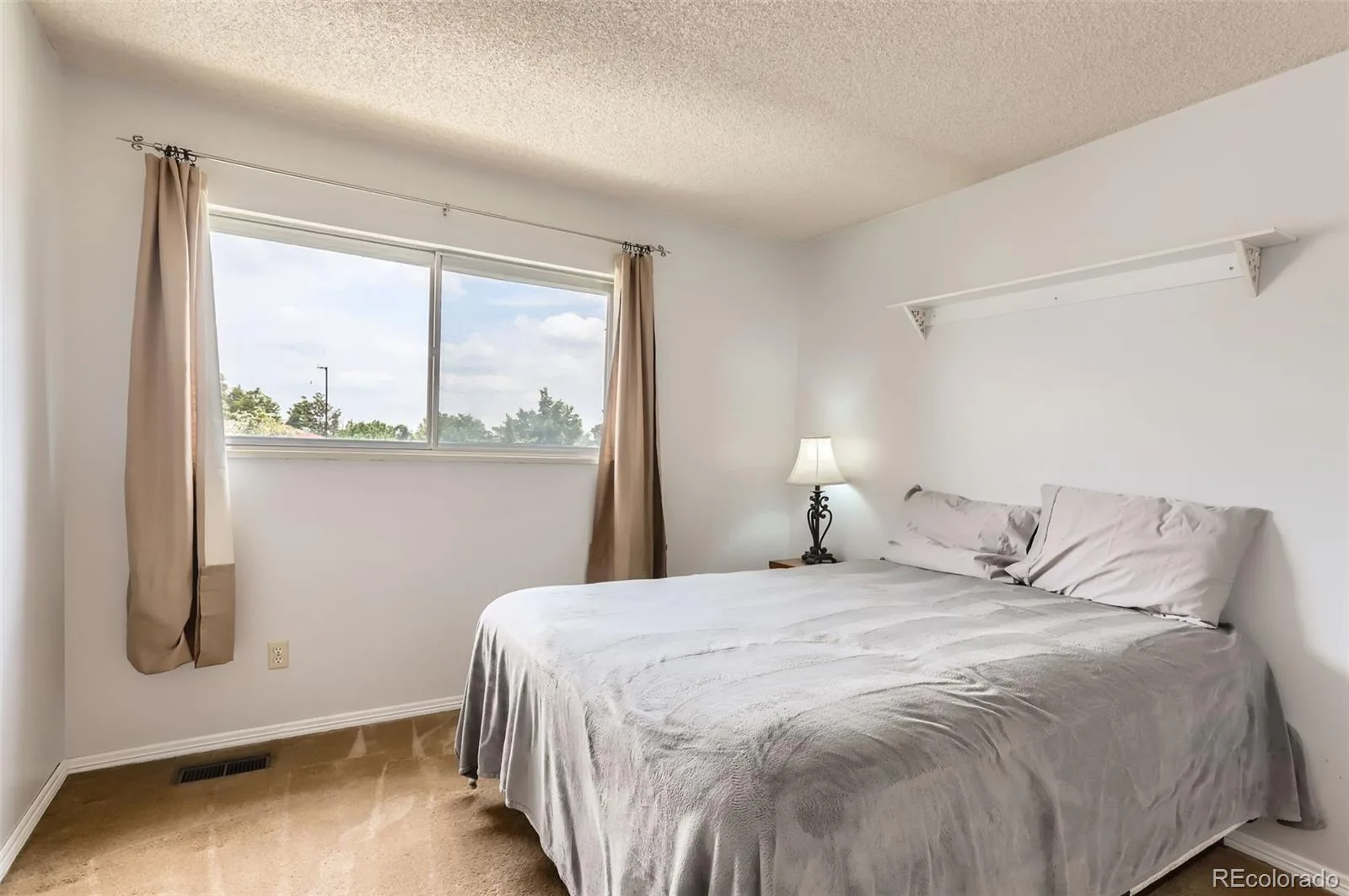 8613 Santa Fe Drive Thornton CO 80260 | MLS #REC2410701 08042026185426 1600 17