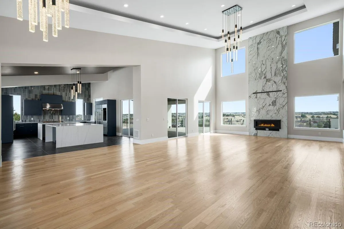 6954 S Espana Way Centennial CO 80016 | MLS #REC2458942 04072026135018 1200 1