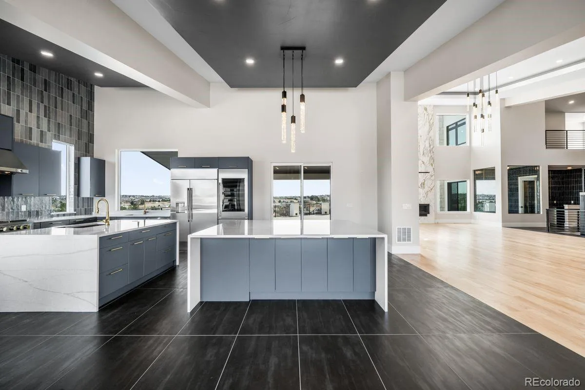 6954 S Espana Way Centennial CO 80016 | MLS #REC2458942 04072026135018 1200 4