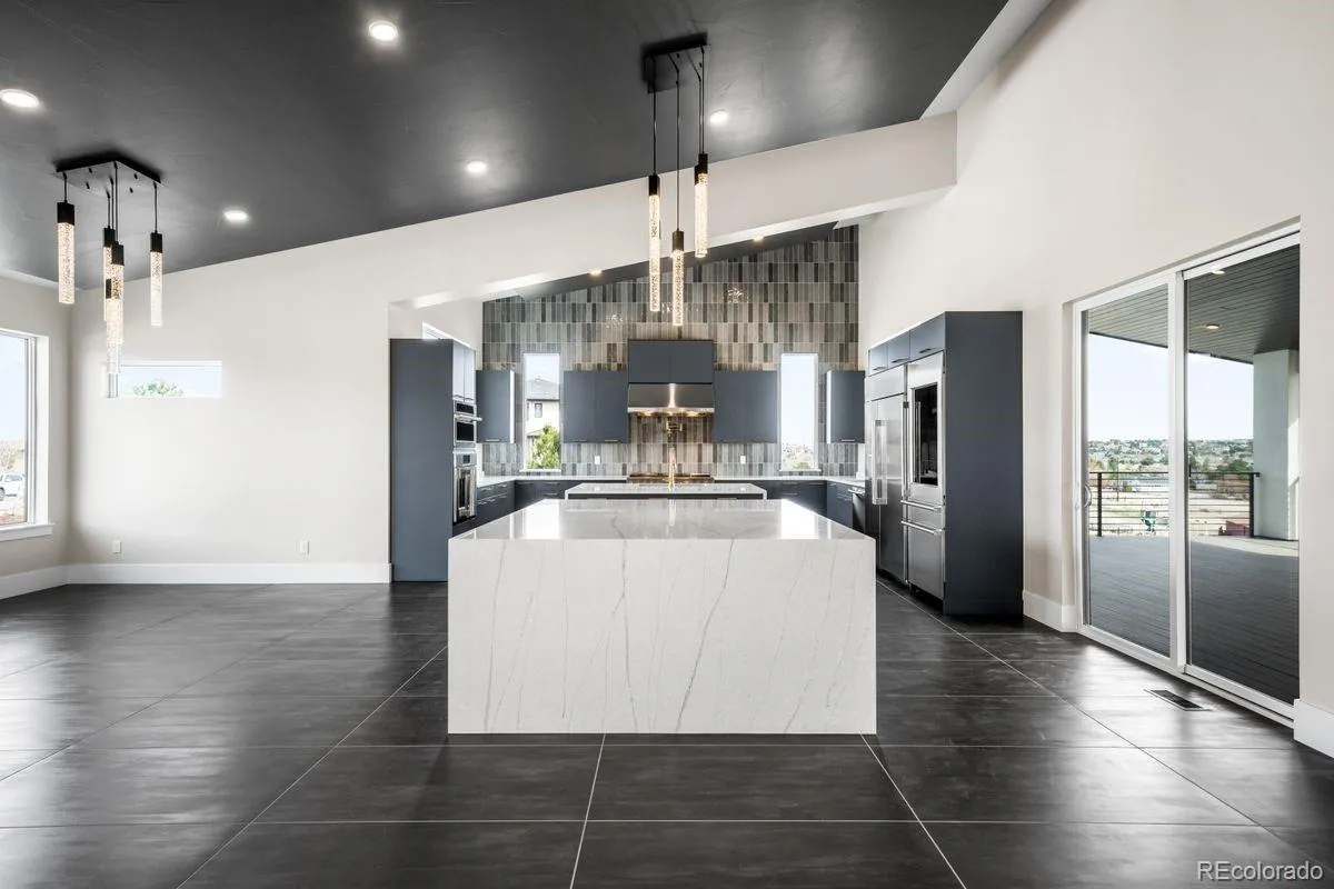6954 S Espana Way Centennial CO 80016 | MLS #REC2458942 04072026135018 1200 5