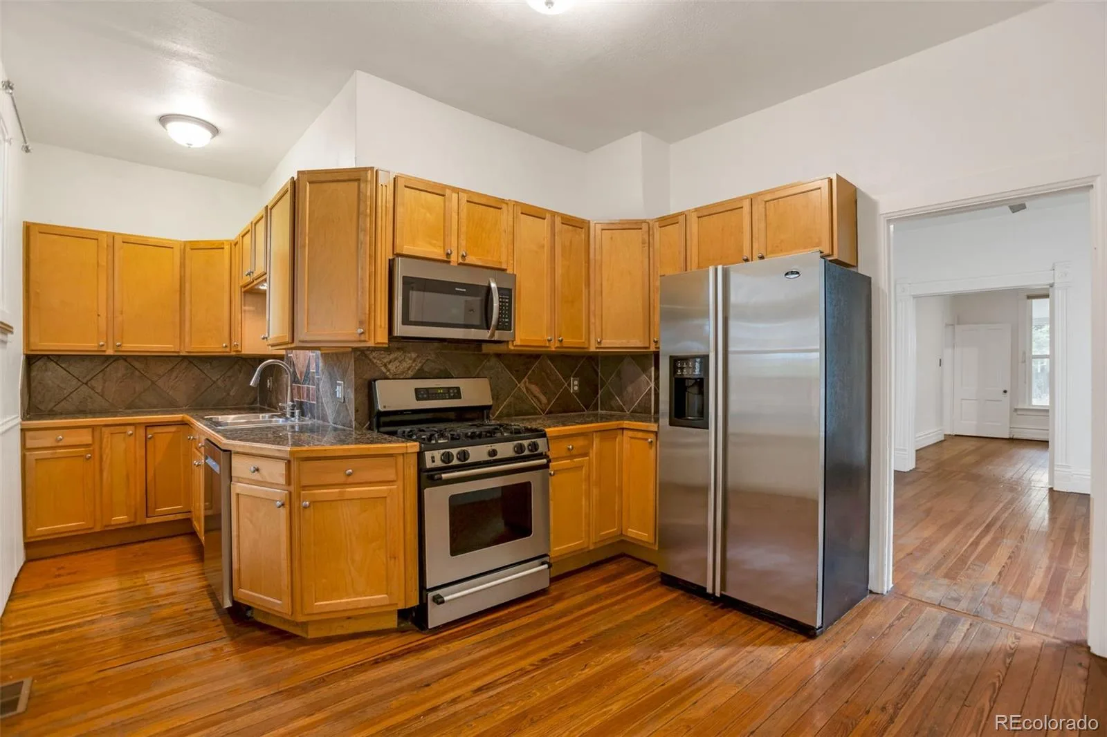 2068 N Ogden Street Denver CO 80205 MLS #REC2476402 07092026163817 1600 2