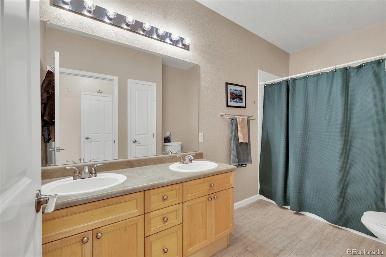 9557 W San Juan Circle #201 Littleton CO 80128 | MLS #REC2493478 08092026180545 1600 26