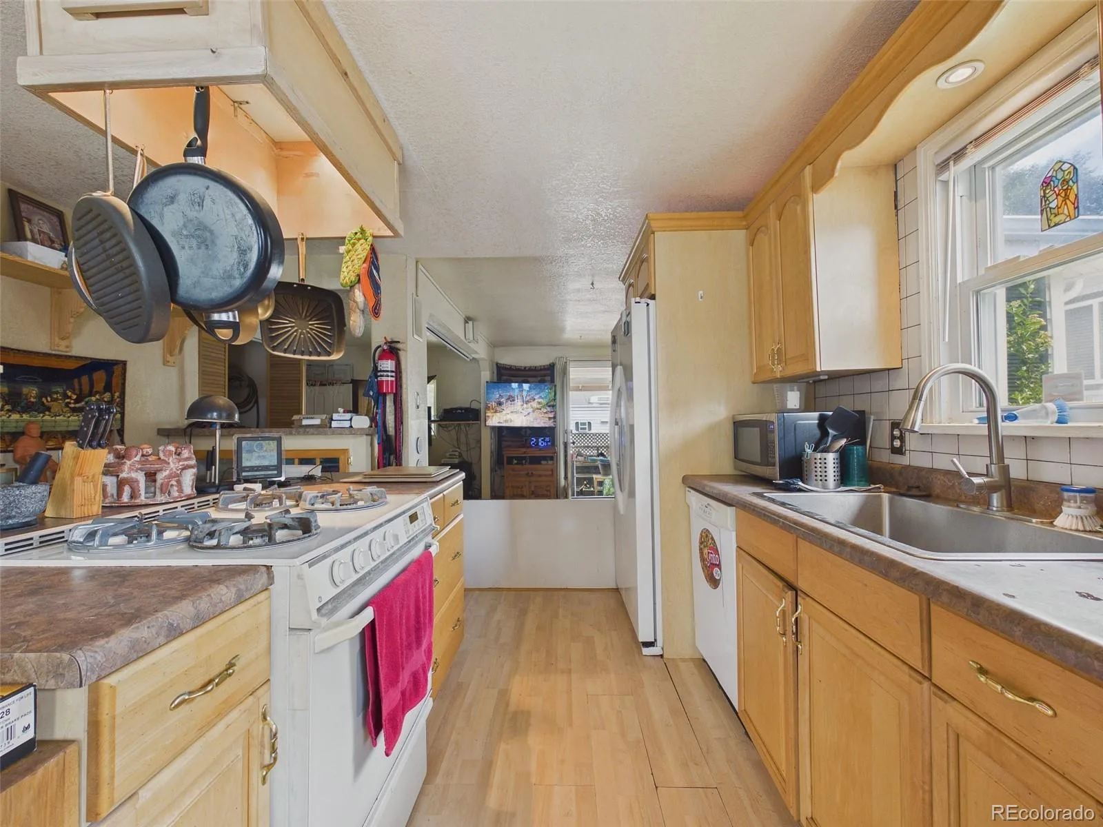 476 Tennyson Street Denver CO 80204 | MLS #REC2519231 06172026000859 1600 3