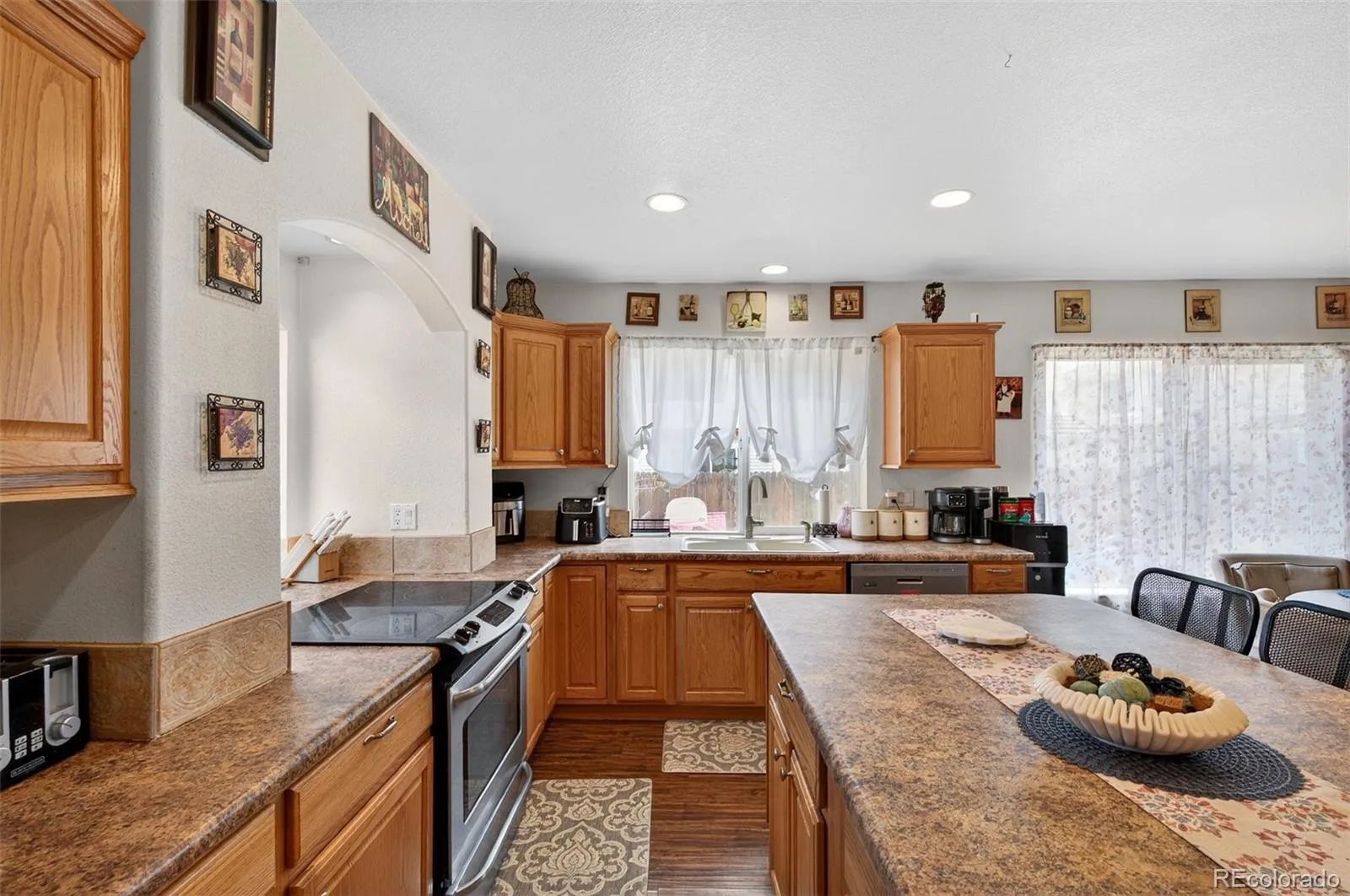 11886 Helena Street Commerce City CO 80022 | MLS #REC2523482 04092026045303 1600 13