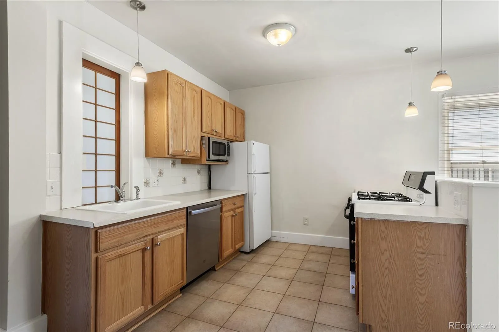 914 E Iowa Avenue Denver CO 80210 MLS #REC2531554 04242026185607 1600 12