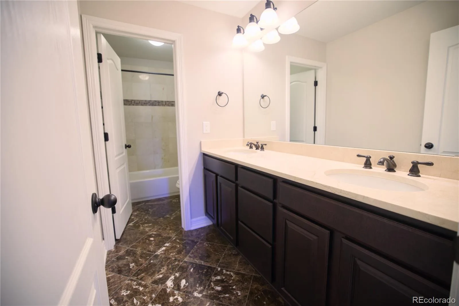 12762 Fisher Street Englewood CO 80112 MLS #REC2547591 07172026165113 1600 17