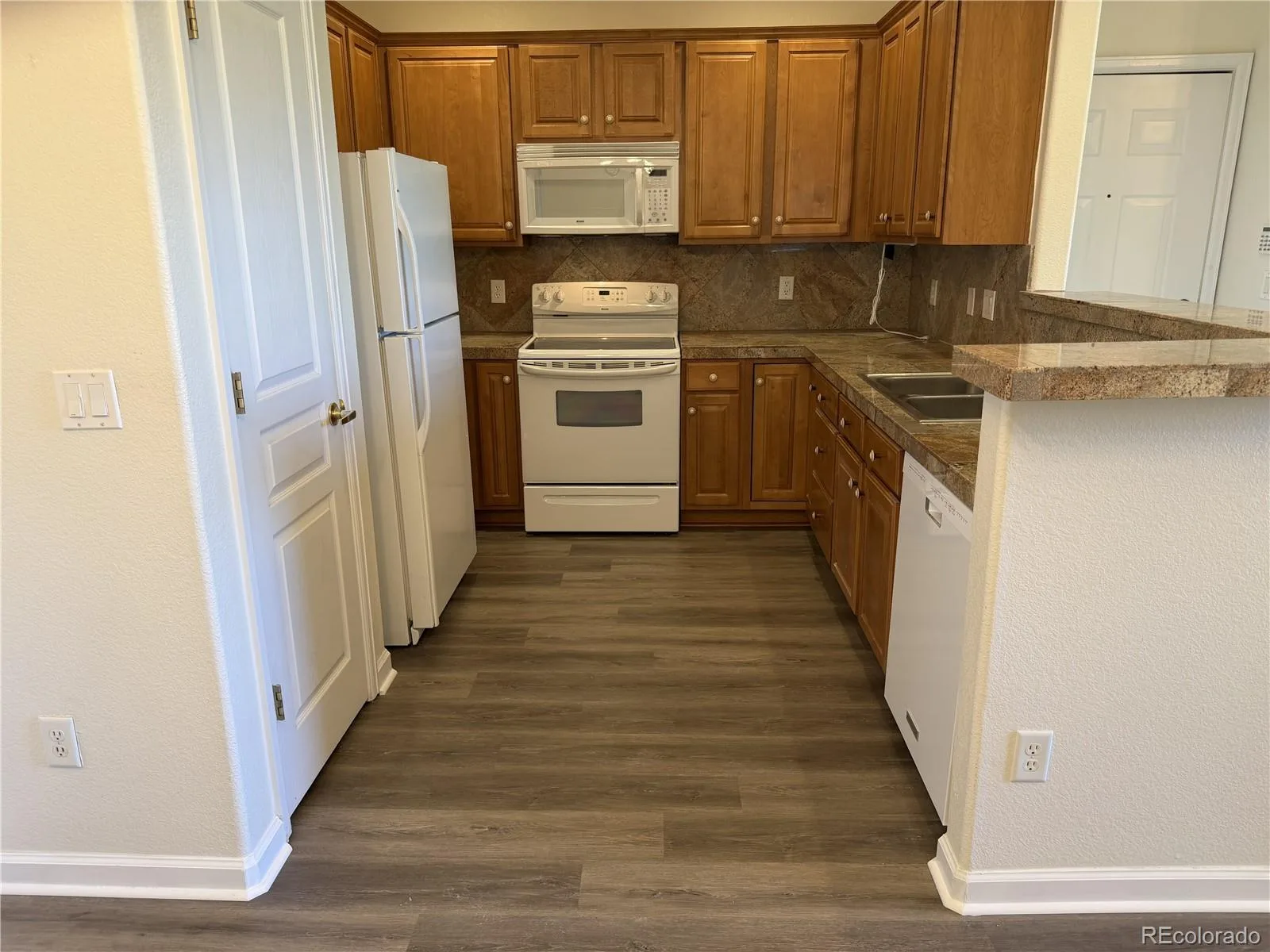8039 Lee Drive #102 Arvada CO 80005 | MLS #REC2604147 07092026193143 1600 12