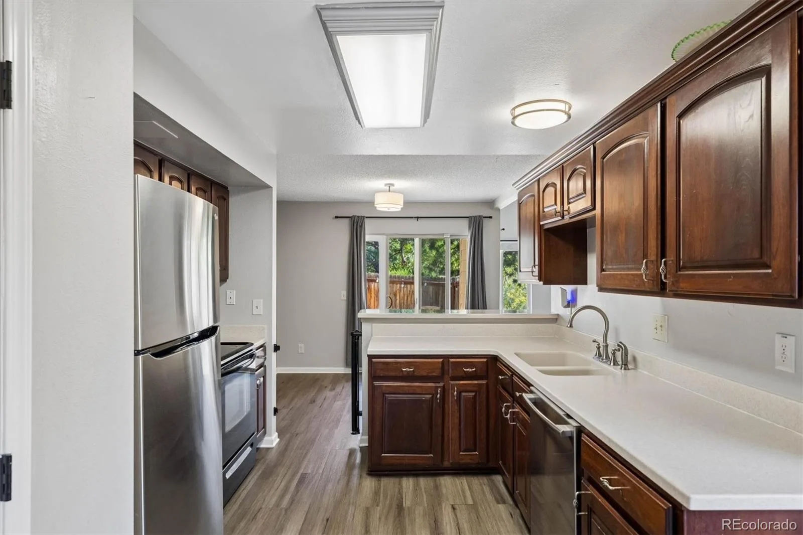 10279 W Fair Avenue #D Littleton CO 80127 | MLS #REC2616568 08292026183429 1600 18