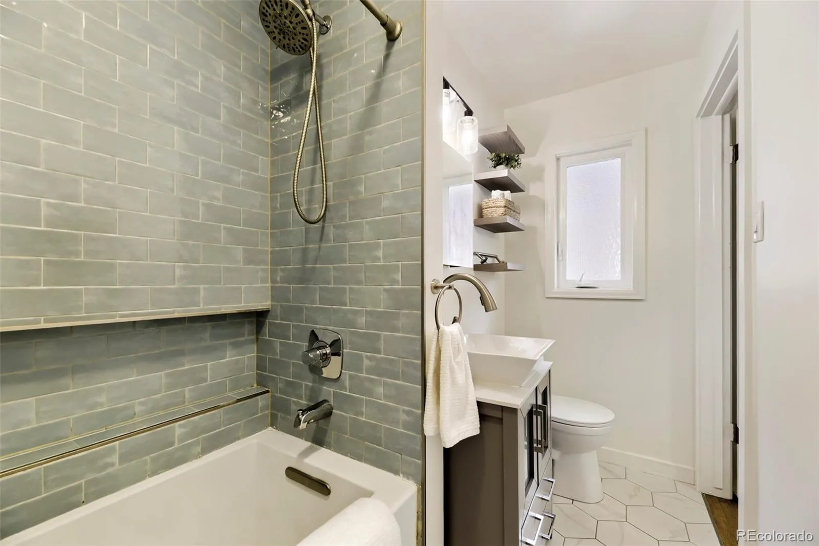 5671 E Bates Avenue Denver CO 80222 MLS #REC2632929 06112026171212 1600 16
