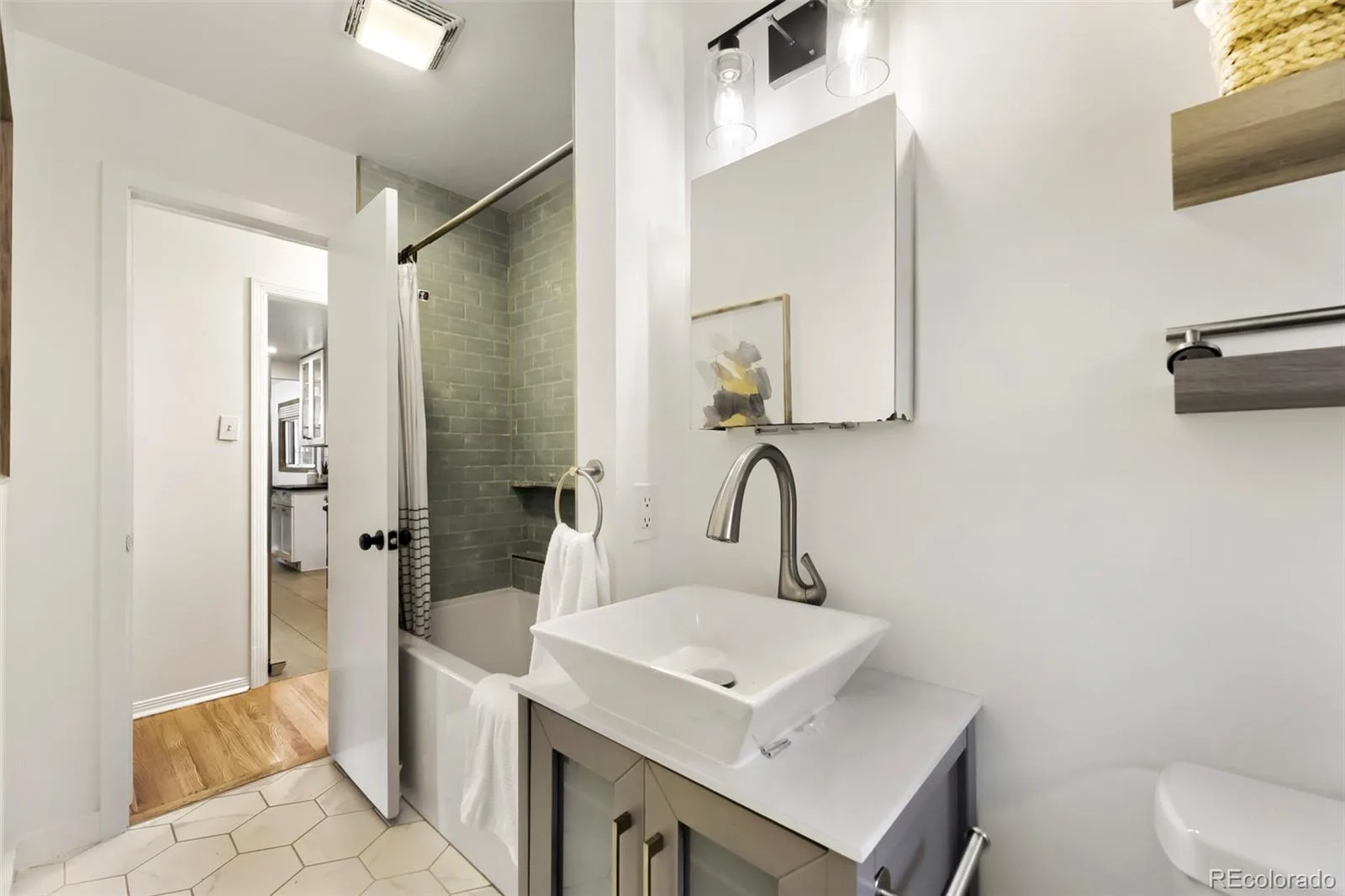 5671 E Bates Avenue Denver CO 80222 MLS #REC2632929 06112026171212 1600 18